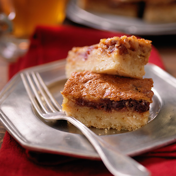 Cranberry bars with shortbread crust and a brown sugar and almond topping.