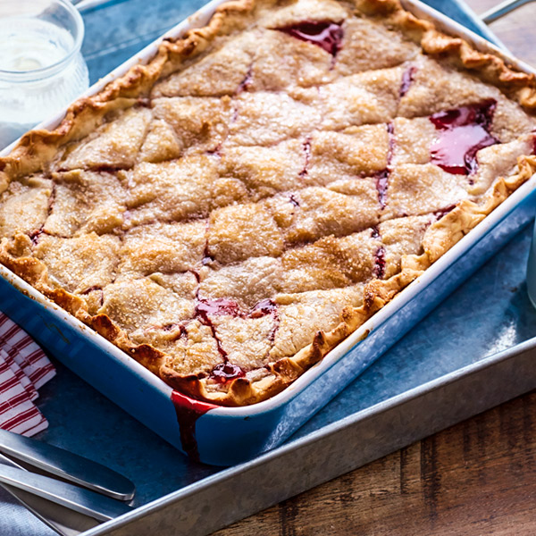 Cherry pandowdy with crispy crust scored in a lattice pattern.
