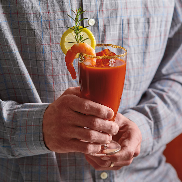 A person holding a Bloody Mary.