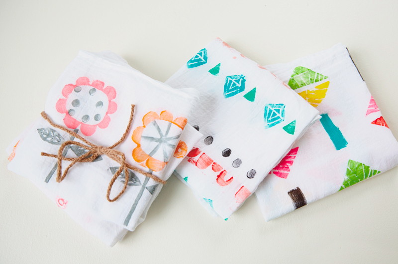 Three different examples of block print tea towels.