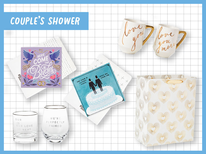 A collection of gifts and cards for an LGBTQ couple's shower, including cards for two brides or two grooms, a set of mugs that reads