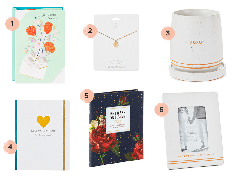 A selection of romantic anniversary gift ideas, including a sweet card that reads,