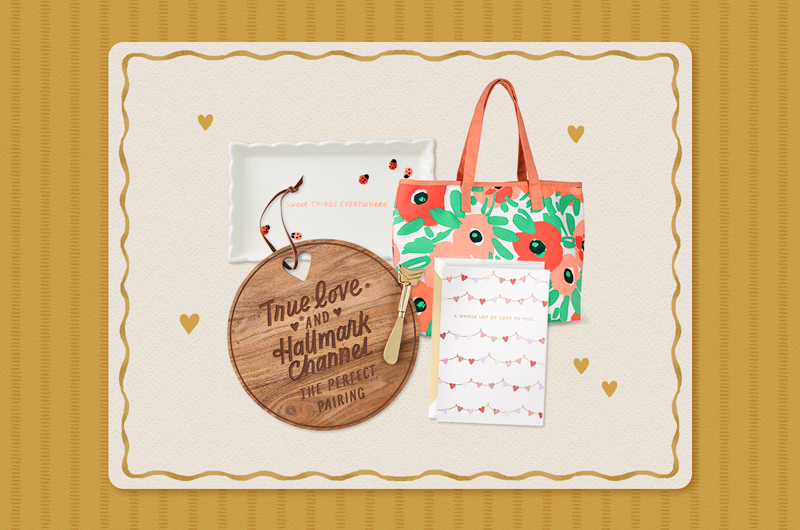 A collection of Valentine's Day gifts meant for a mom that include a wooden serving board that reads,