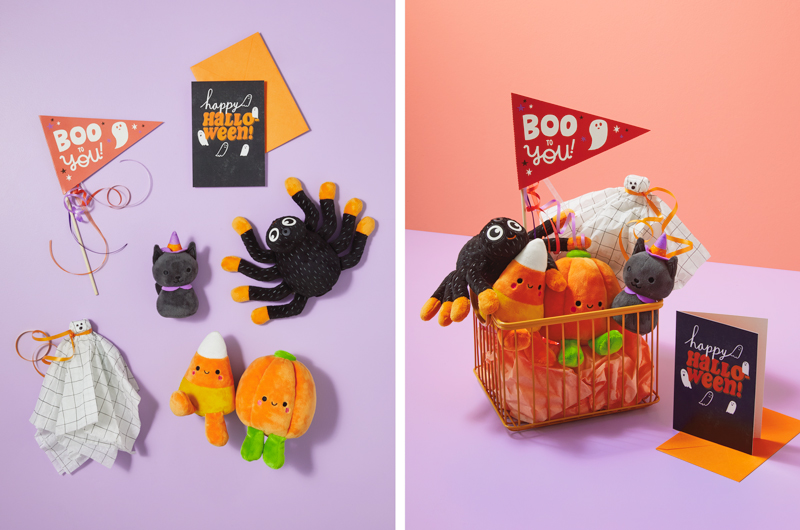 A Halloween boo bag kit for a small child includes a Zip-Along plush spider, an itty bittys witch cat plush, a Better Together Candy Corn and Pumpkin plush set, a squeezable fruit pouch disguised as a little ghost, a card that reads